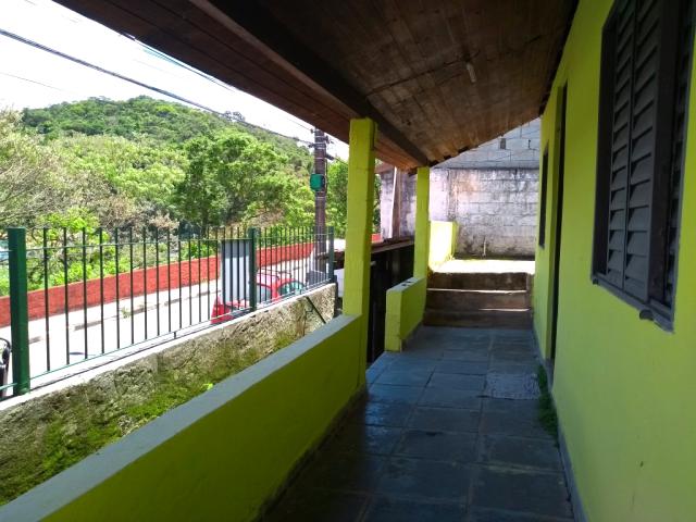 Terreno com duas casas no centro