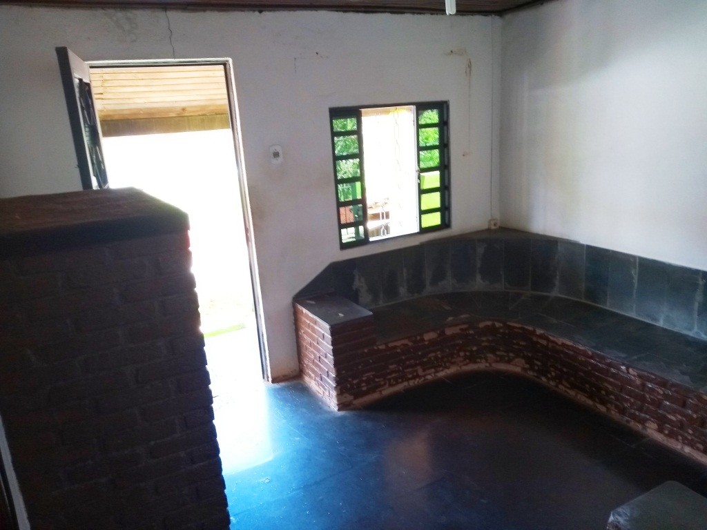 Terreno com duas casas no centro