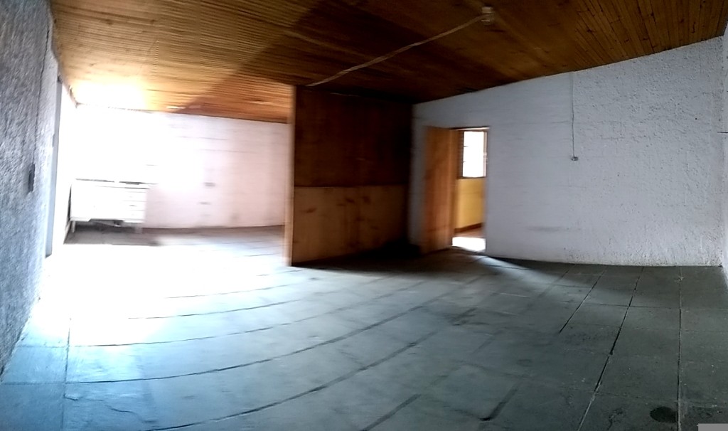 Terreno com duas casas no centro